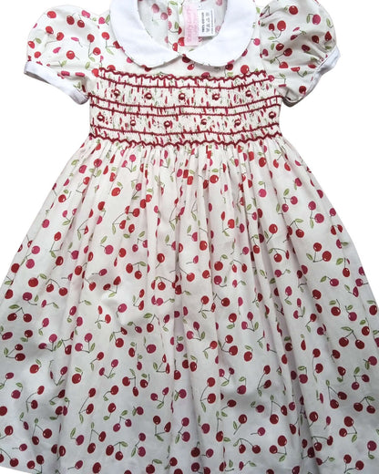 PRE-ORDER Smocked Cherry Dress featuring hand-smocking and cute cherry print, perfect for spring and summer.