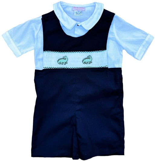 Hand-smocked Dinosaur John John outfit in navy with white shirt, perfect for preschool photos, birthdays, holidays, or daily wear.