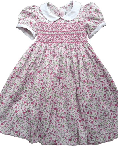 Smocked Lulu Floral Dress with pink floral design, white collar, and puff sleeves - perfect for spring, pre-order now!