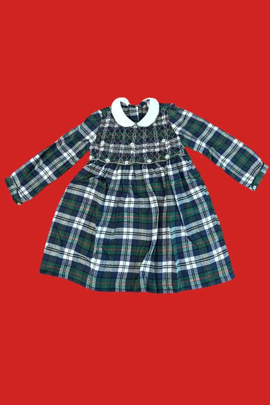 Sample Smocked Holiday Plaid Dress featuring hand-smocked detail and a classic collar on a vibrant red background.