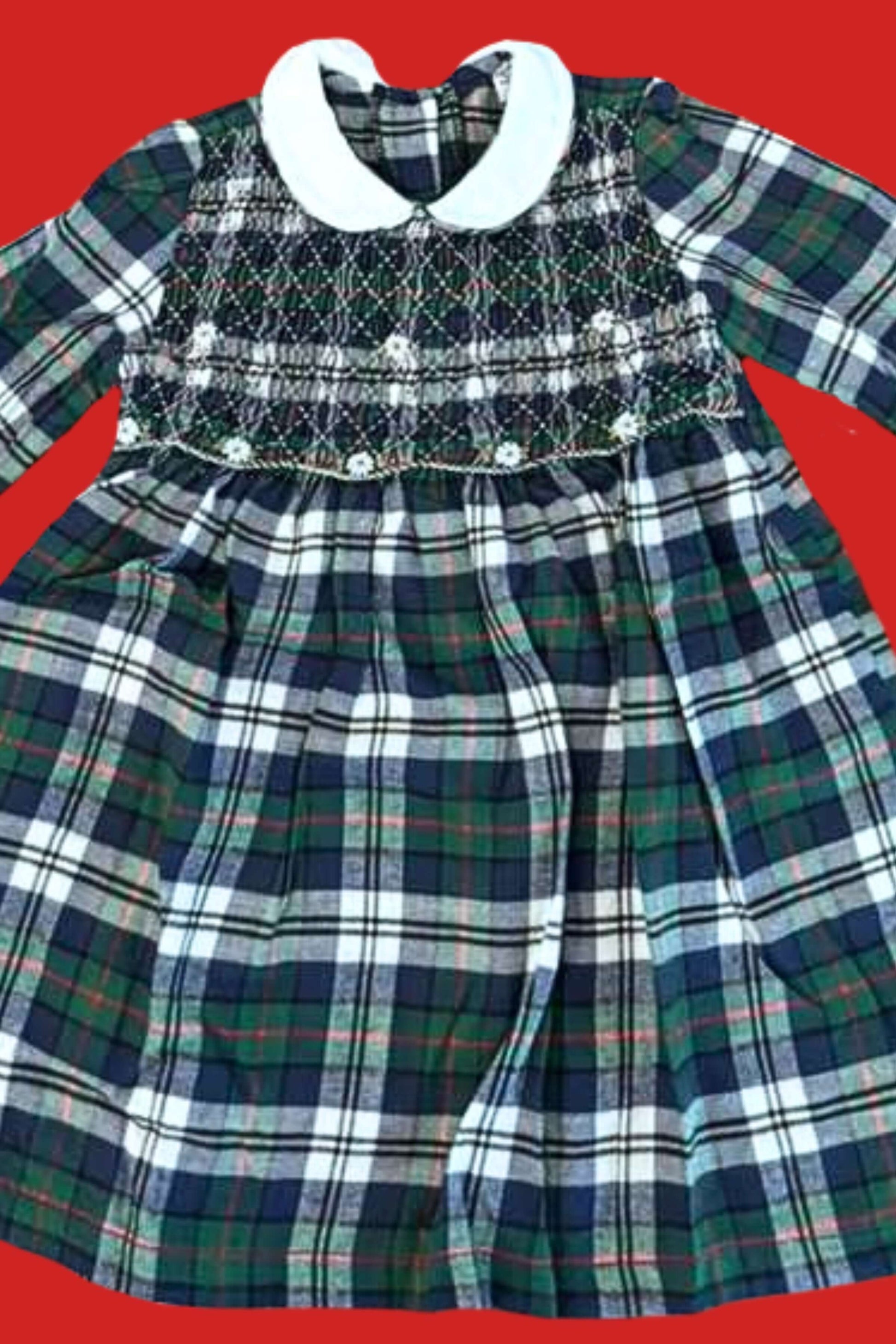 Sample Smocked Holiday Plaid Dress with hand-embroidered details and classic plaid pattern.