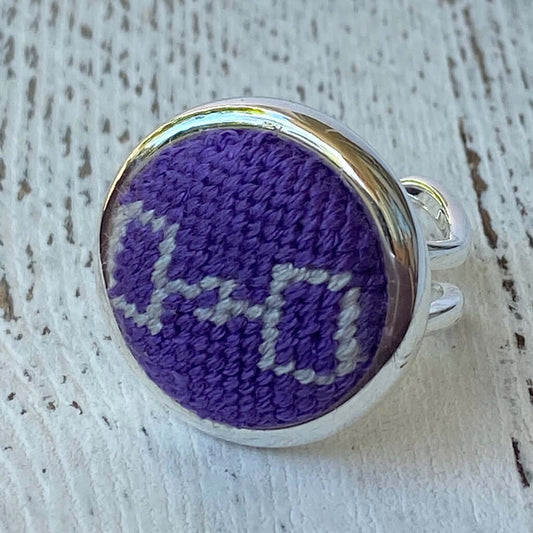 Purple and Silver Snaffle Bit Needlepoint Ring with adjustable arms, perfect equestrian gift and versatile accessory.