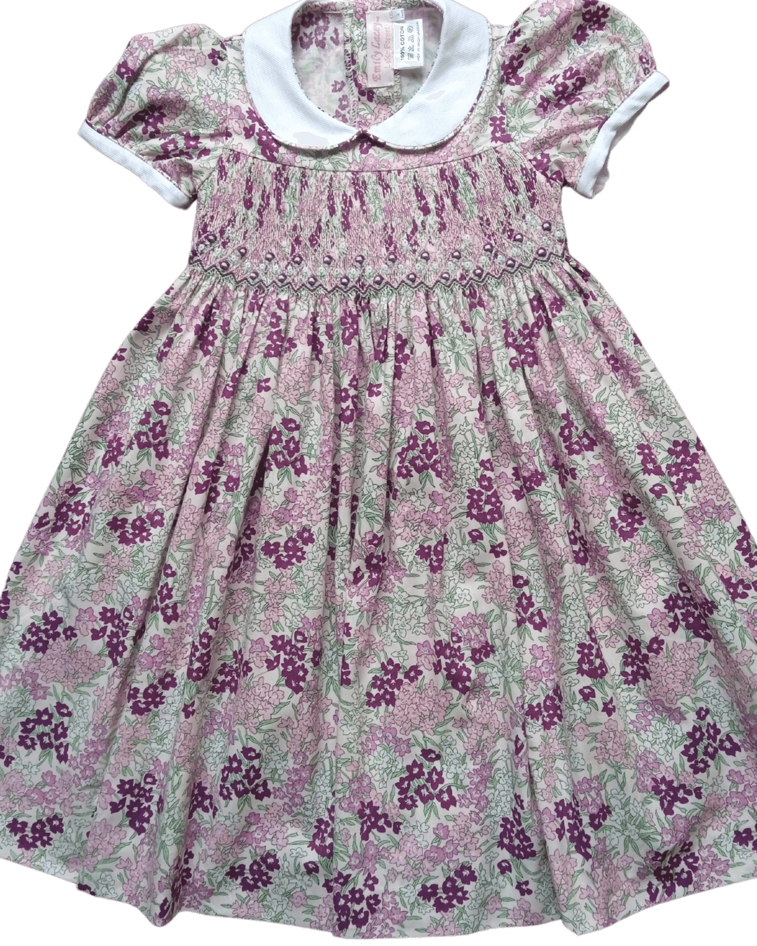 PRE-ORDER Smocked Violet Floral Dress with white collar, crafted in elegant violet floral cotton, perfect for spring.