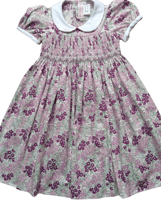 PRE-ORDER Smocked Violet Floral Dress with white collar, crafted in elegant violet floral cotton, perfect for spring.