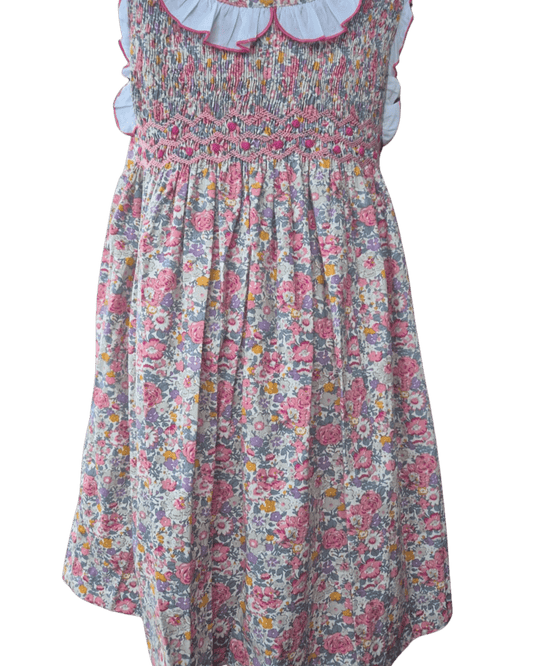 SAMPLE Smocked Floral Ruffle Dress with pink floral embroidery and ruffle collar, perfect for special occasions.